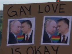 Sign shown by protesters against he Hungarian law